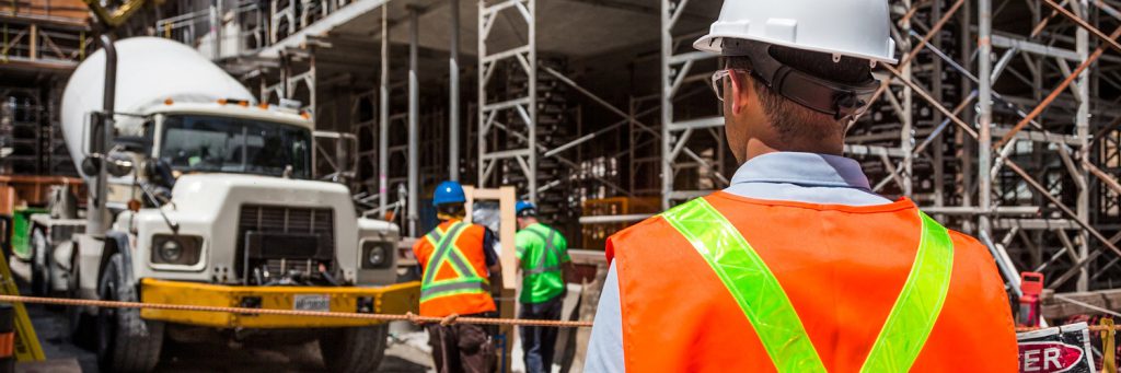 construction worker overlooking job site