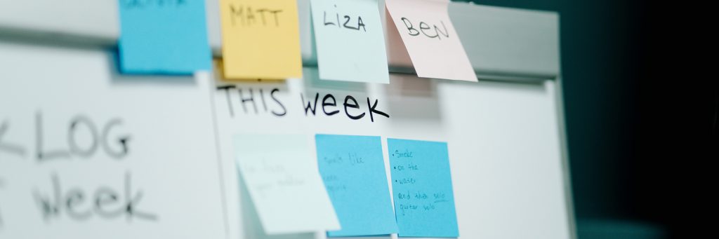 to do list on whiteboard with sticky notes