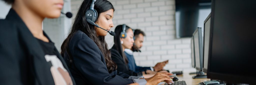 people working while wearing headsets