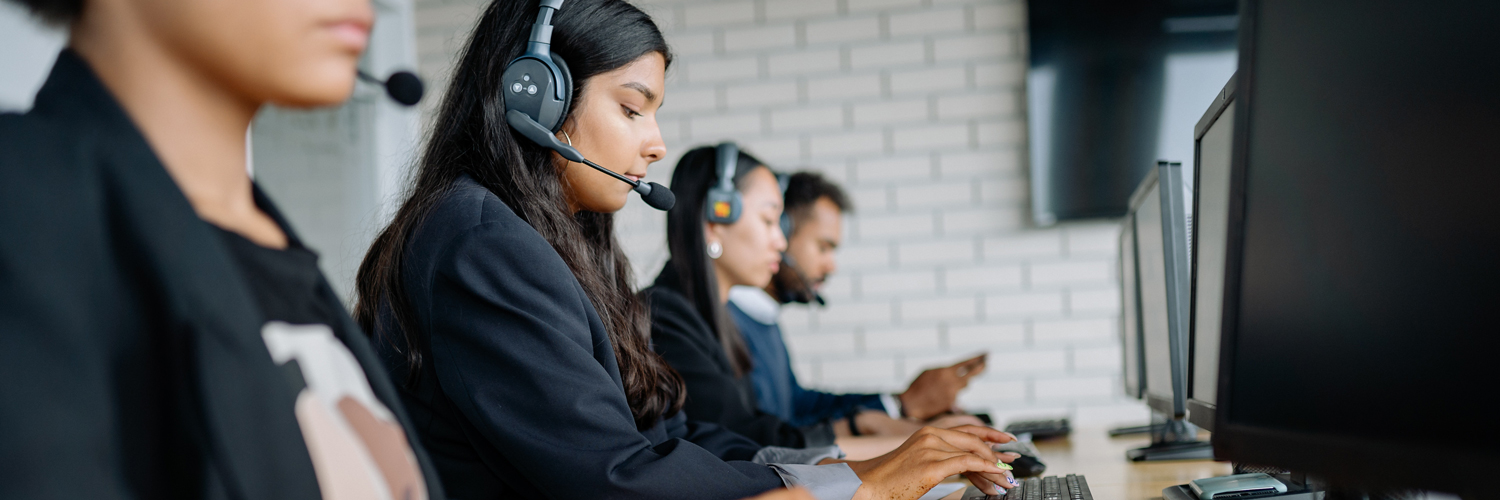 people working while wearing headsets