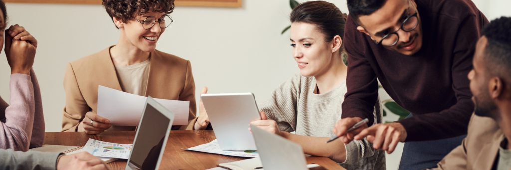 happy employees working together and communicating