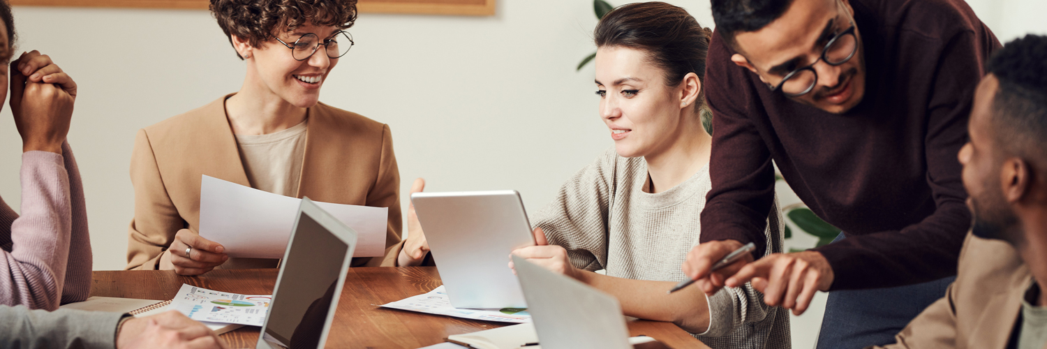 happy employees working together and communicating