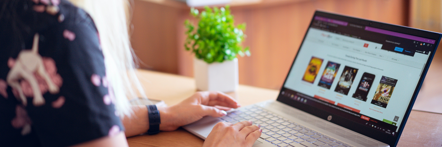 woman doing work on laptop