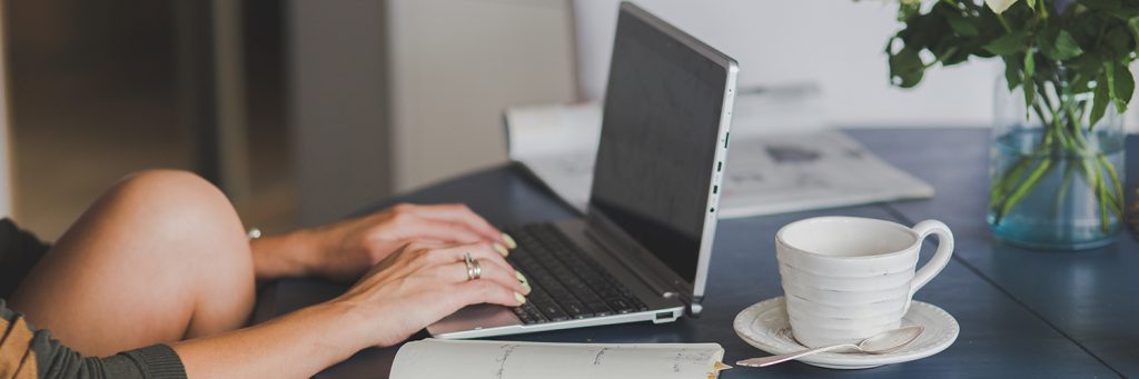 sitting at table working from home