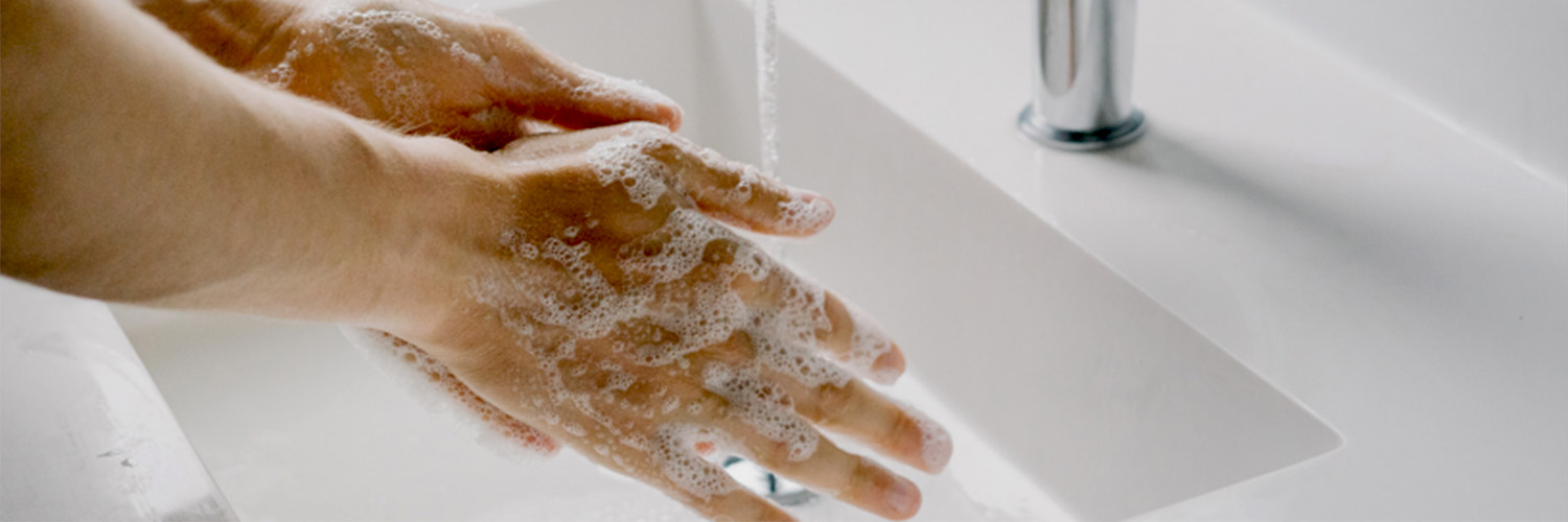 Washing hands in the sink