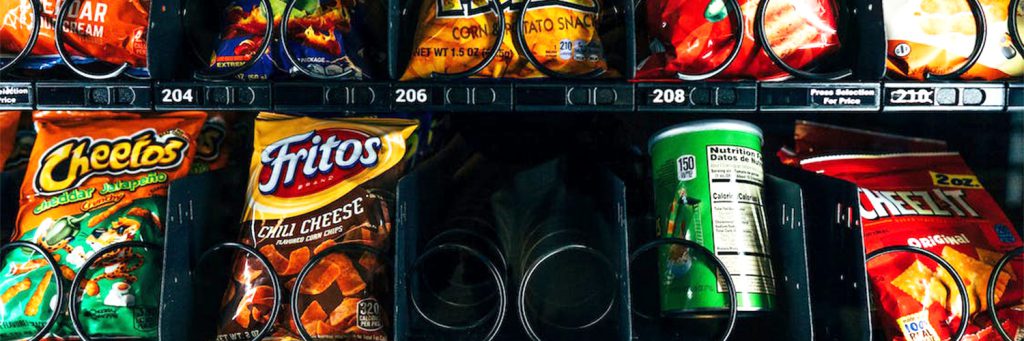 Vending machine showing various snacks