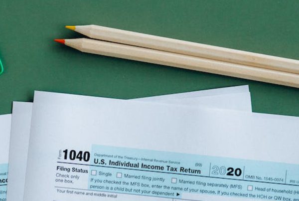 Tax documents on the table with pencils