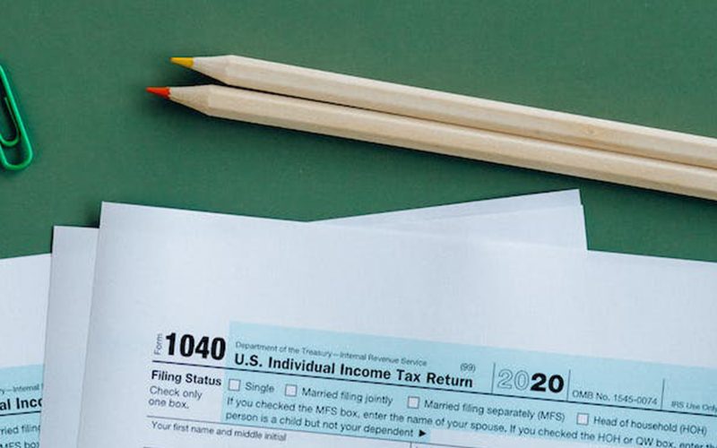 Tax documents on the table with pencils