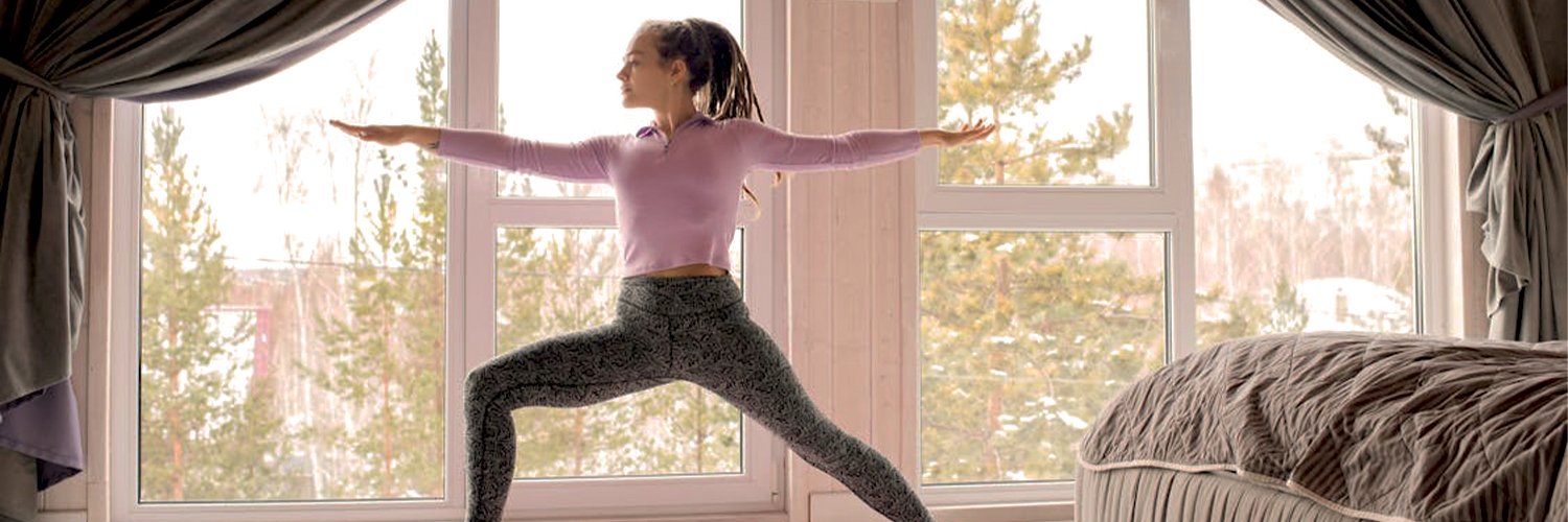 Woman doing yoga to prioritize work life balance