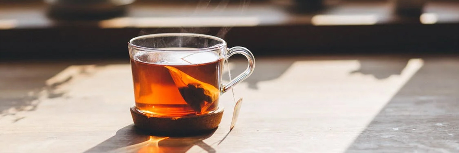 Hot tea in mug on the counter