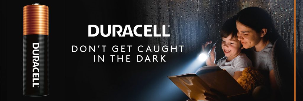 mother son with flashlight