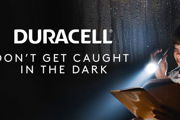 mother son with flashlight