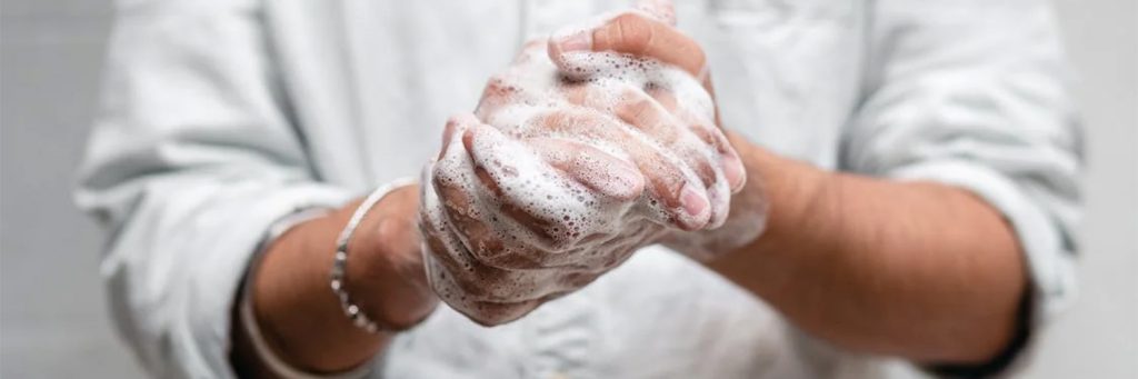 person washing hands