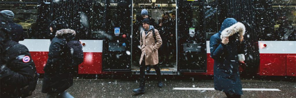 walking off bus in snow