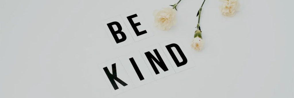 be kind lettering with flowers