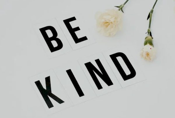 be kind lettering with flowers