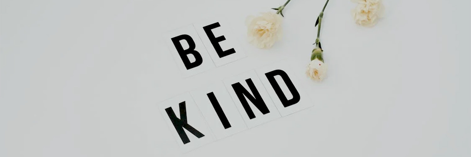be kind lettering with flowers